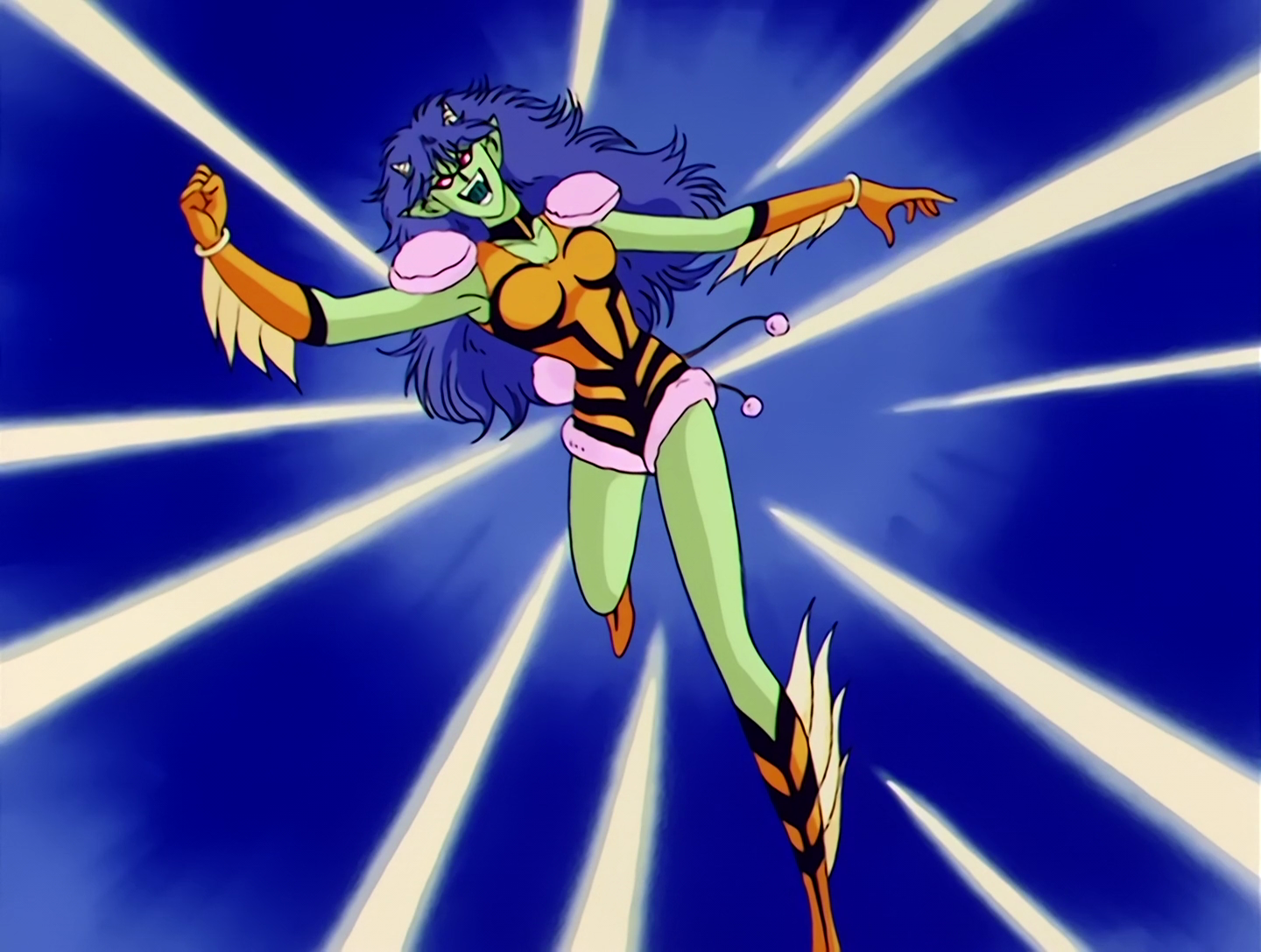 Amanju, a Cardian from Sailor Moon episode 57. She has light green skin, dark blue hair, red eyes, and oni-like horns on her head. Furthering the oni connection, her outfit is yellow with black pattens vaguely resembling tiger stripes. She has fluffy pink fabric lining parts of her outfit, and also two pink pom-poms hanging from it.